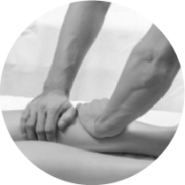 Hands massaging a person's calf muscle